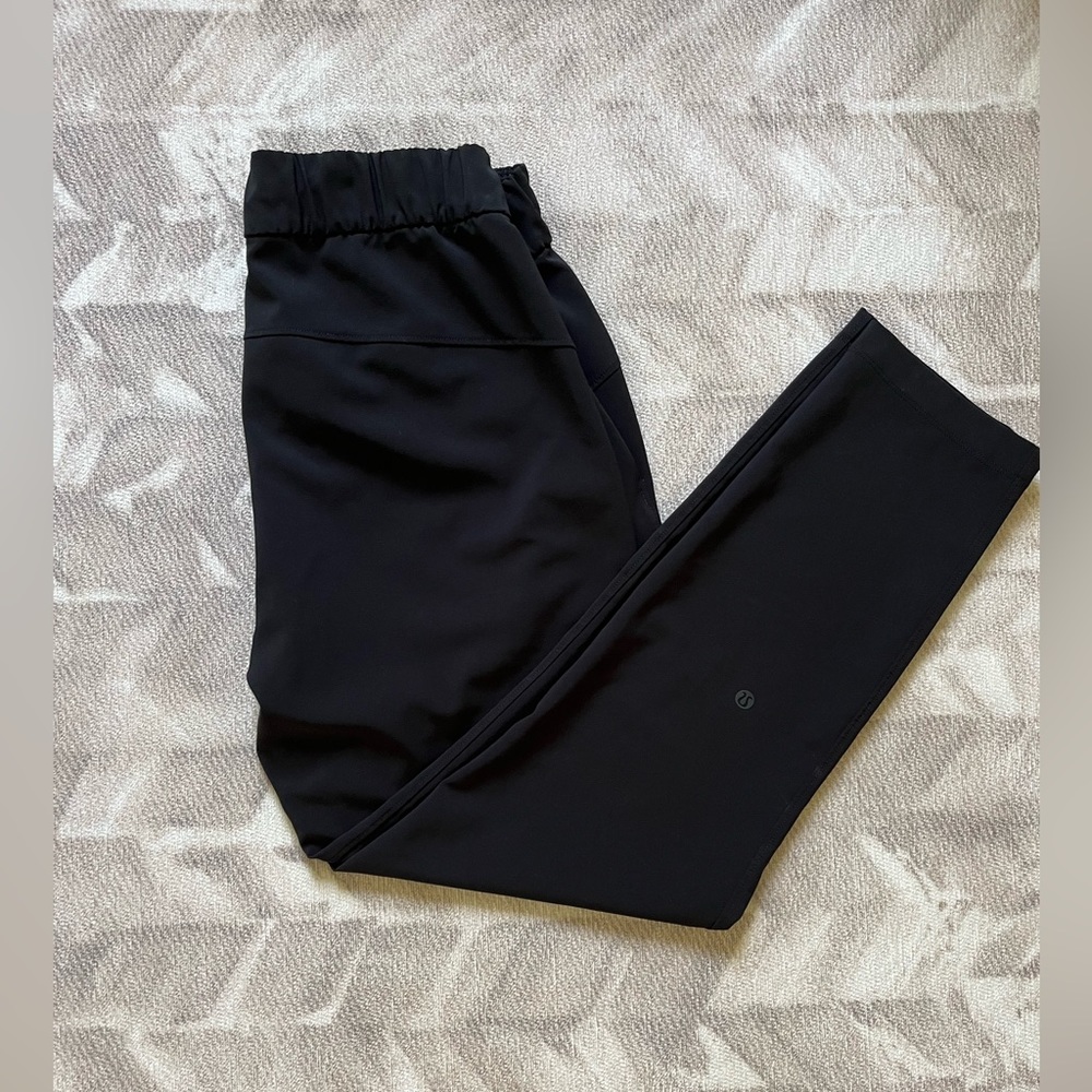 Lululemon On The Fly Pant *Woven 28" size 6 BLACK